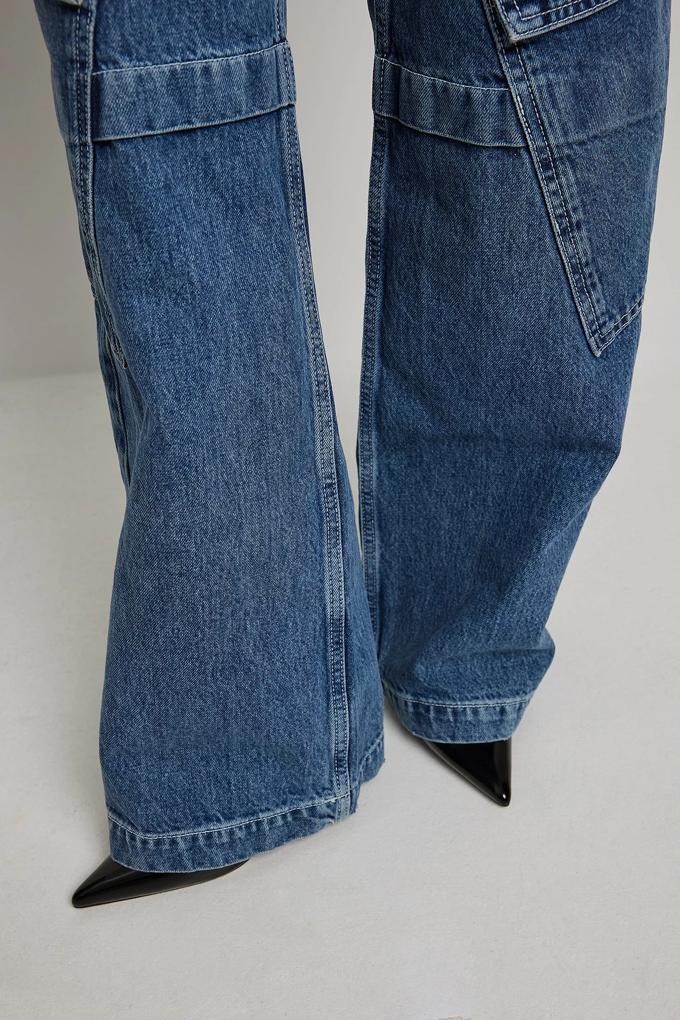 NA-KD Low Waist Waist Asymmetric Cargo Full Length Jeans - Image 7