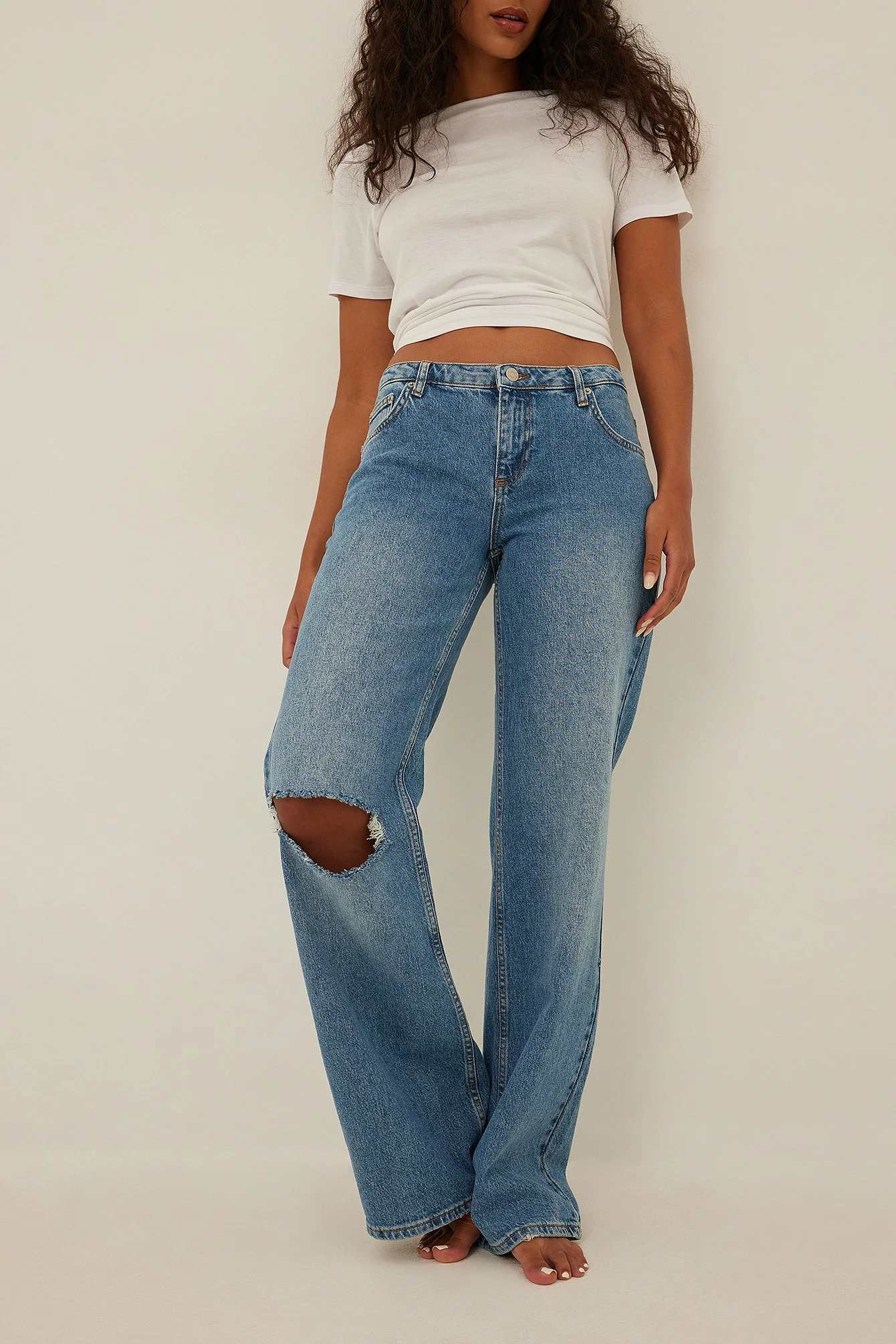 NA-KD Trend Super Low Waist Distressed Jeans - Image 2